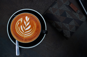 A barista making a latte